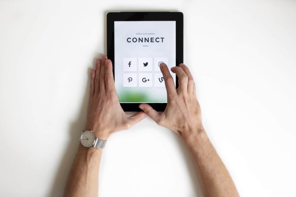Tablet displaying social media icons