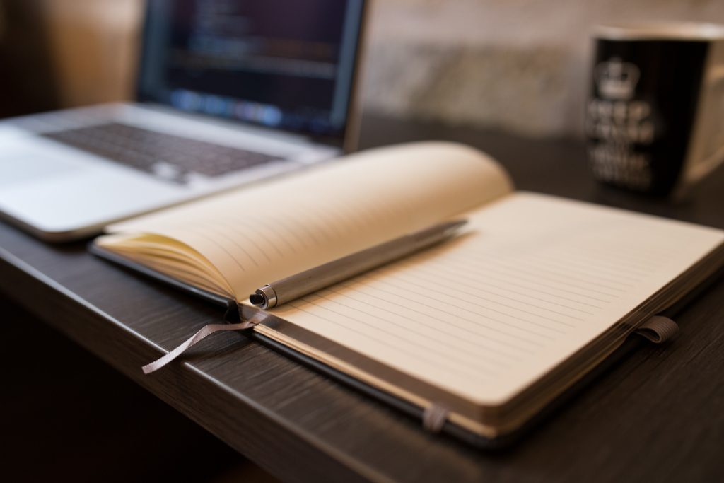 Open notebook and pen