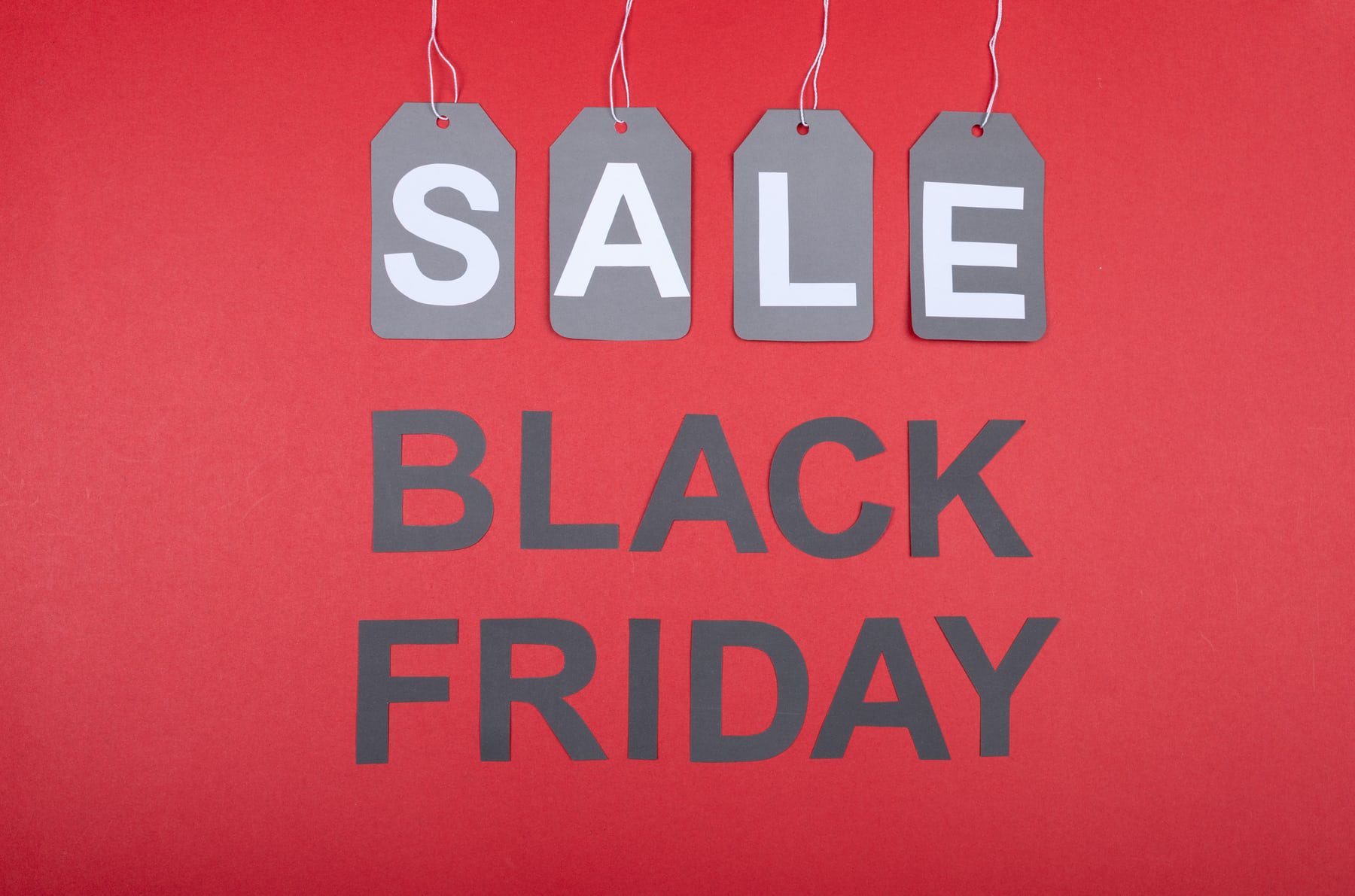 Black Friday Sale Tag Graphic on red background