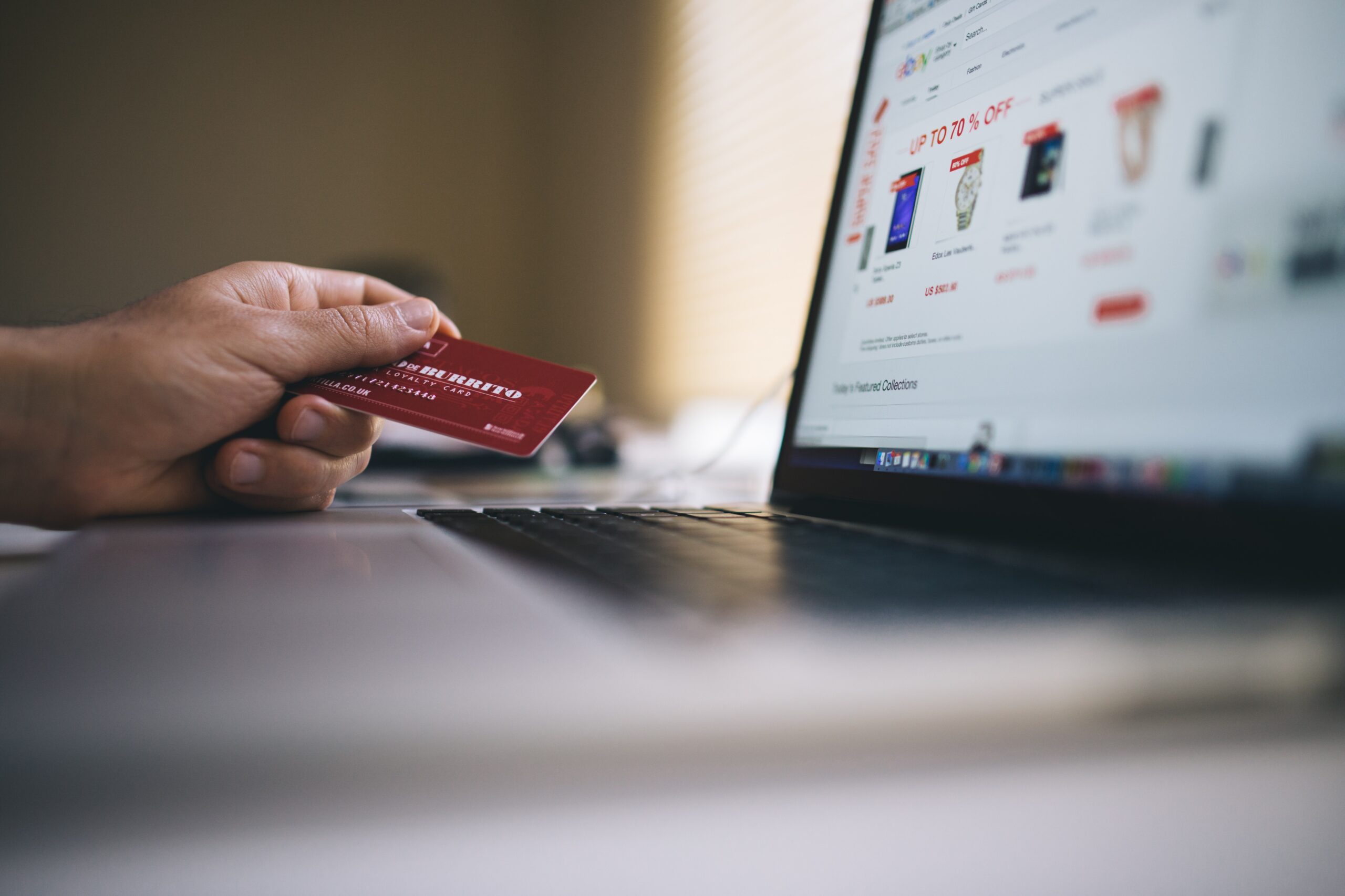 Person shopping online using a payment card