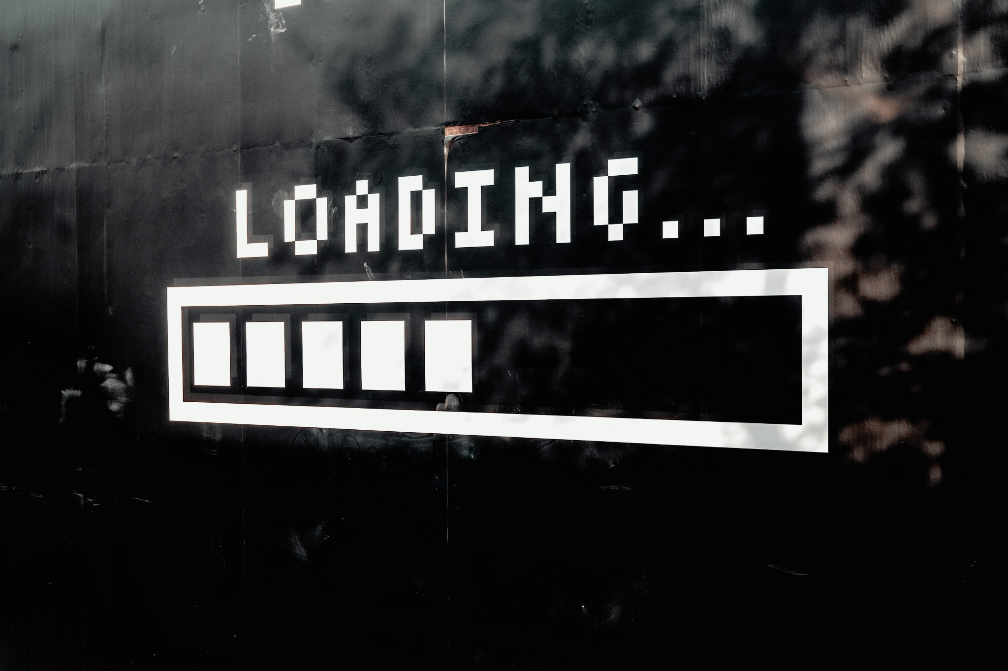 A retro loading screen on a black background